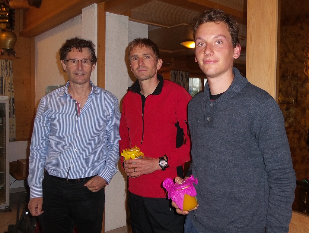 Mila-Chef mit dem Tagessieger und dem drittschnellsten Mann